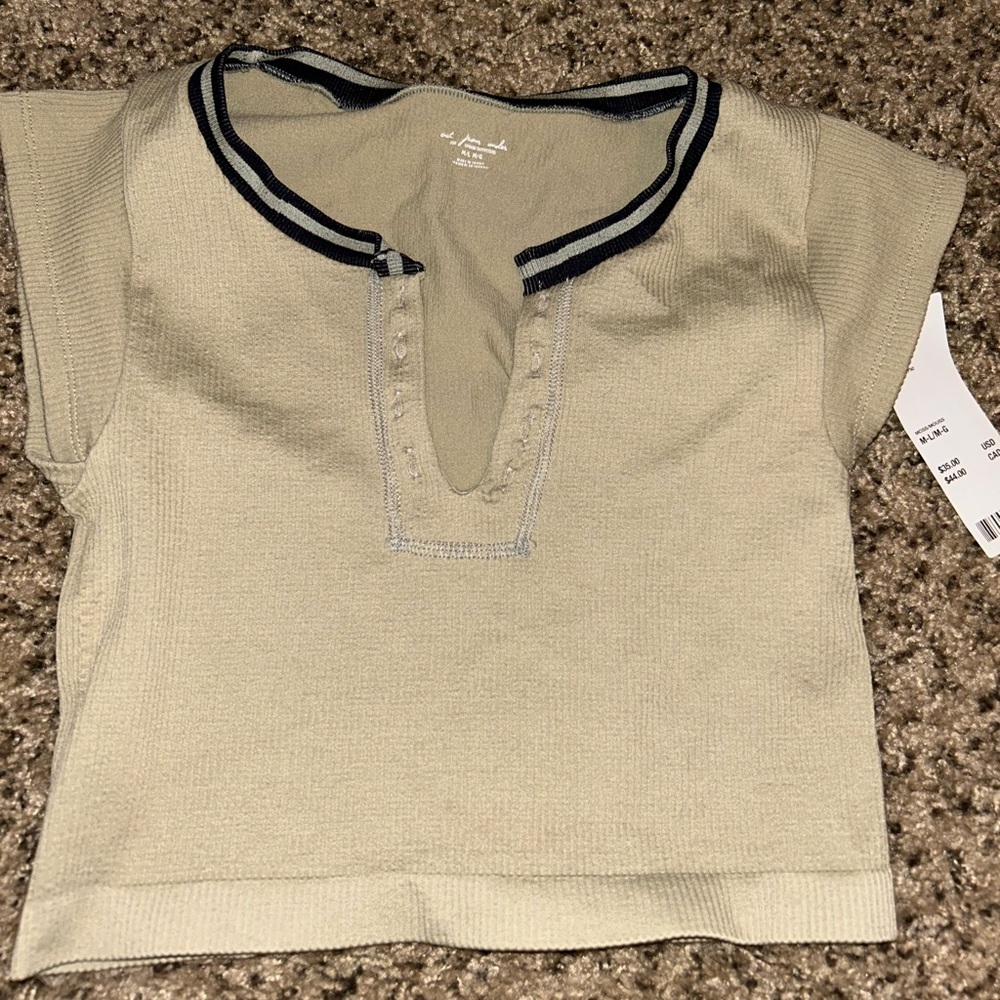 Urban Outfitters out from under crop top